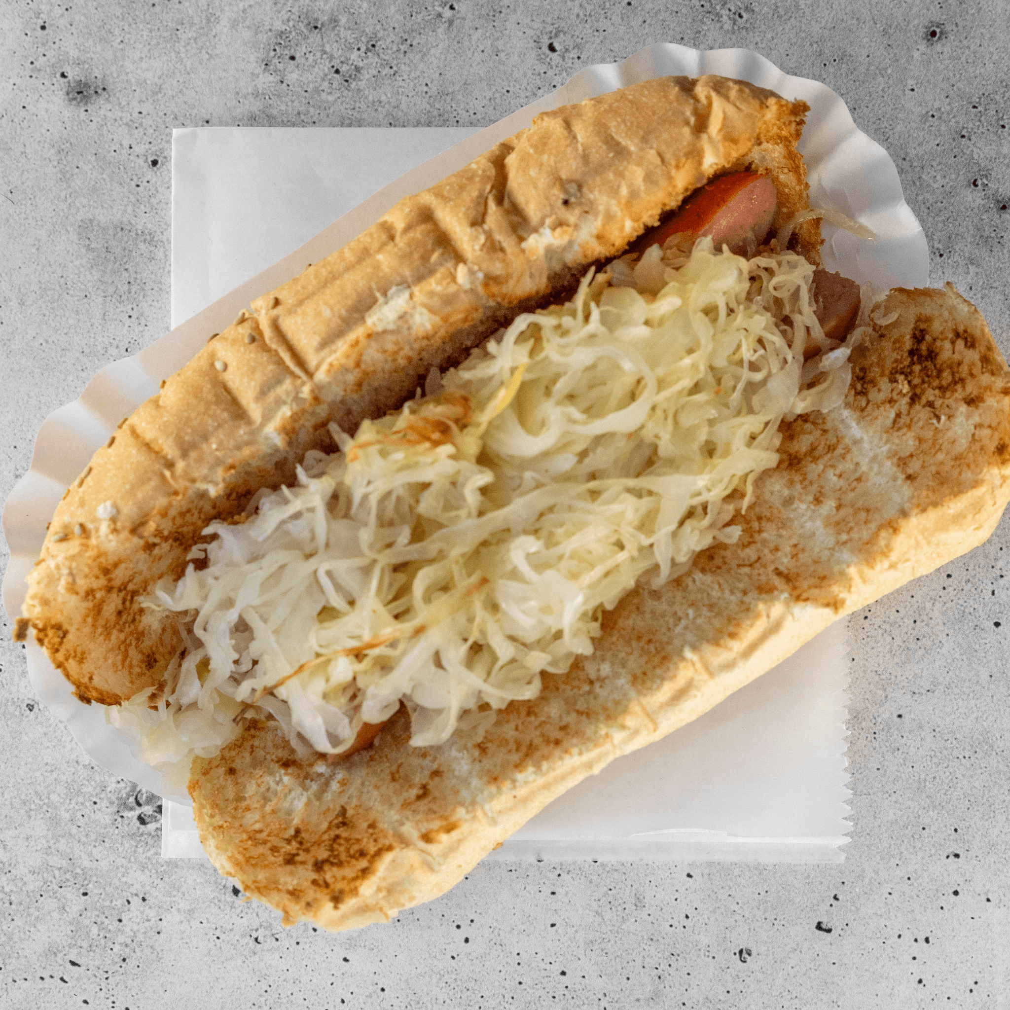 Quarter Pound Kraut Dog.